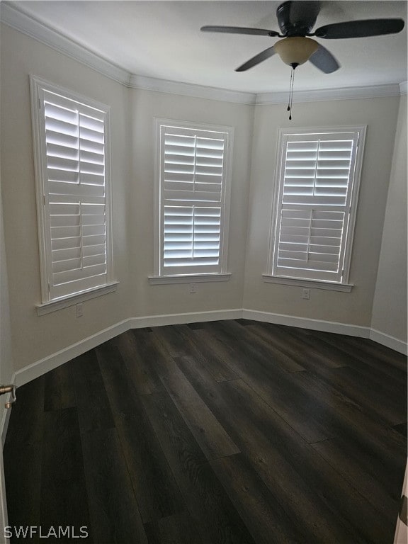 unfurnished room featuring crown molding, ceiling fan, and dark wood-type flooring