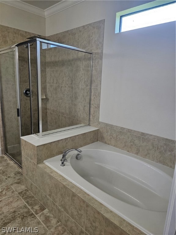 bathroom featuring tile patterned floors, separate shower and tub, and ornamental molding