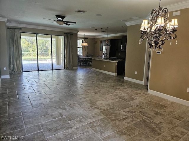 unfurnished living room with ceiling fan with notable chandelier and crown molding