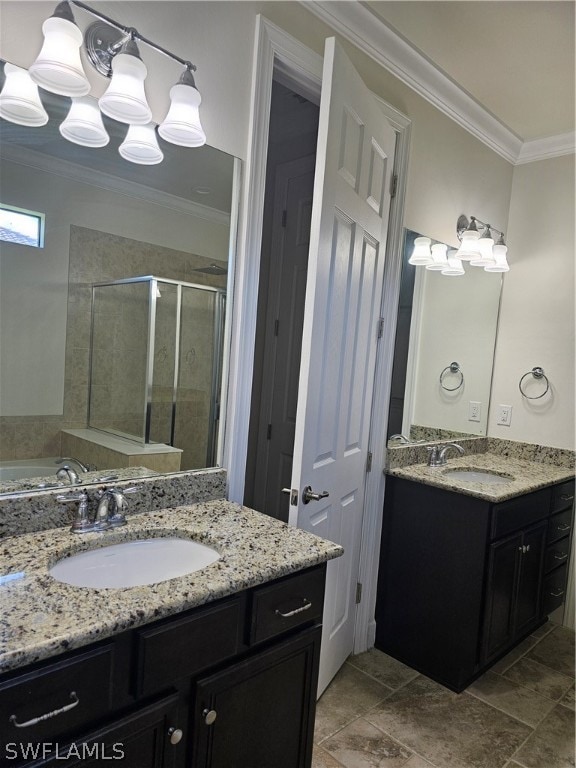 bathroom with shower with separate bathtub, vanity, and crown molding