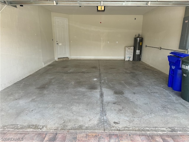 garage featuring water heater and a garage door opener