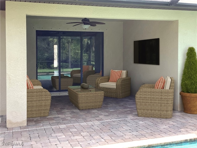 view of patio / terrace with outdoor lounge area and ceiling fan