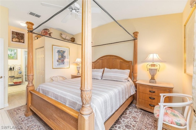 bedroom featuring ceiling fan and a closet