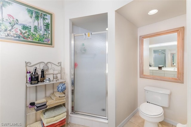 bathroom featuring toilet, tile patterned floors, and walk in shower