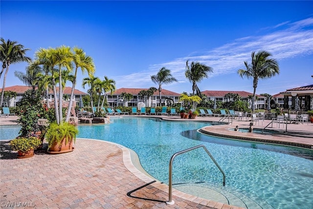 view of swimming pool featuring a patio