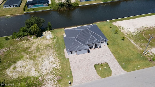 bird's eye view with a water view