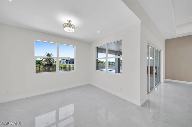 view of tiled spare room