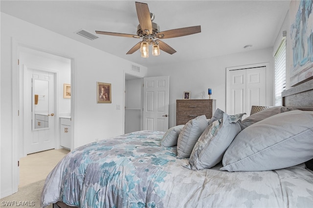 bedroom with ceiling fan, a closet, and light carpet