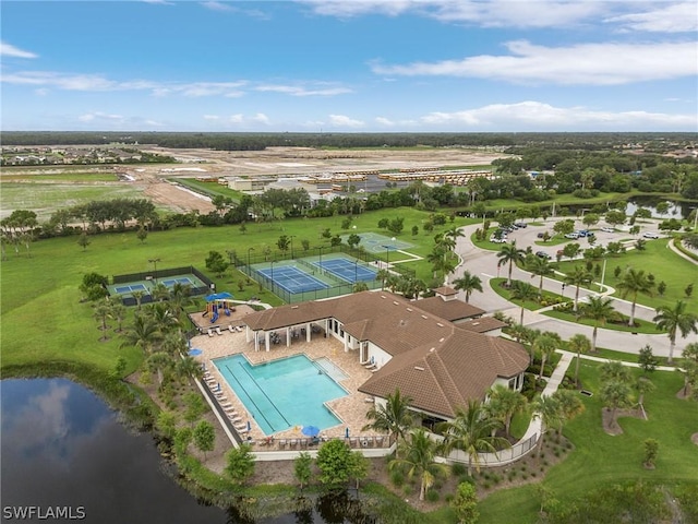 birds eye view of property featuring a water view