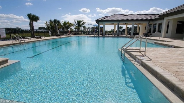 view of swimming pool featuring a patio