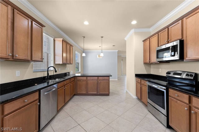 kitchen with appliances with stainless steel finishes, sink, hanging light fixtures, light tile patterned floors, and ornamental molding