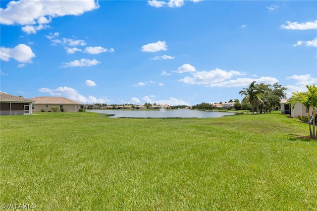 view of yard with a water view