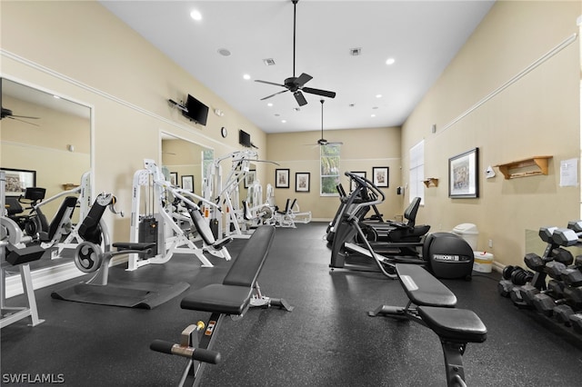 exercise room with ceiling fan