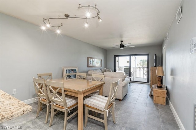 dining space with ceiling fan