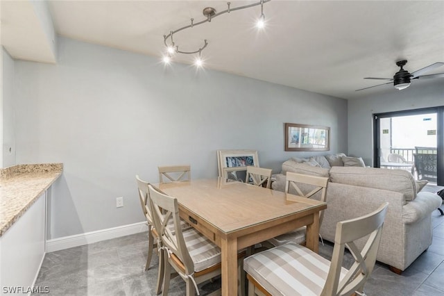 dining room featuring ceiling fan