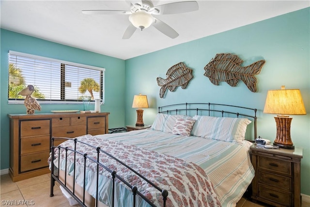 bedroom featuring light tile patterned floors and ceiling fan