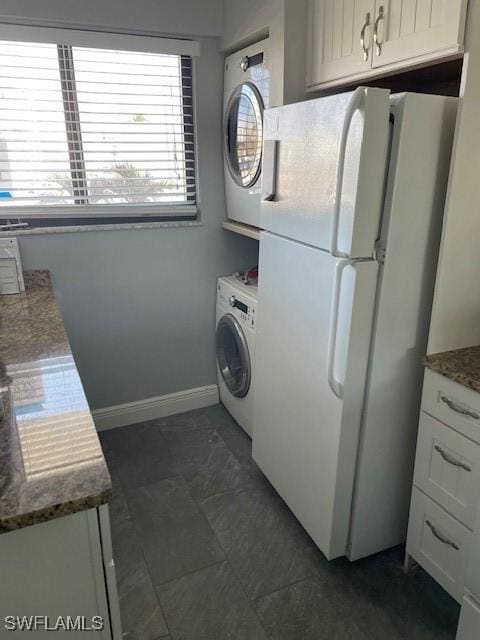 washroom with washer / clothes dryer