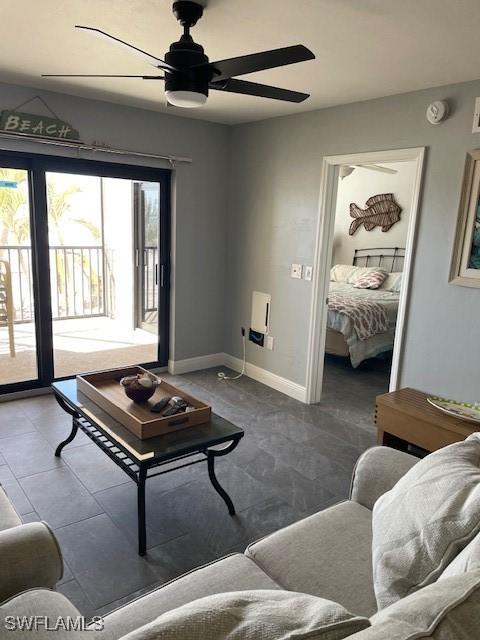 living room featuring ceiling fan