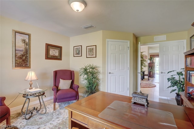 office area with light tile patterned floors