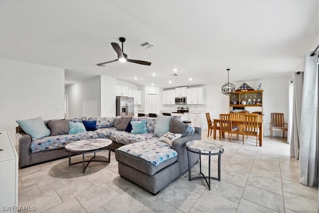 living room featuring ceiling fan