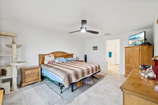 tiled bedroom with ceiling fan