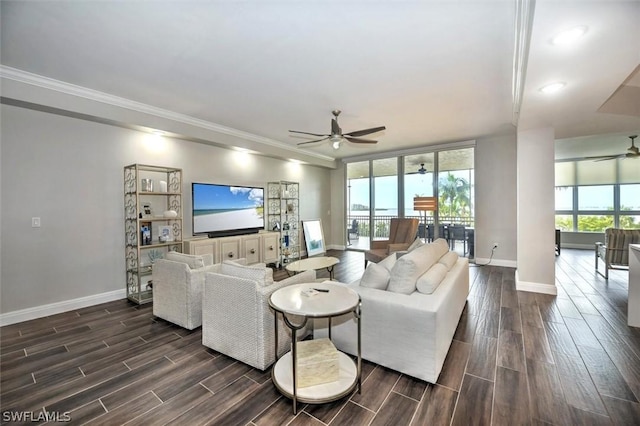 living room with ceiling fan and crown molding