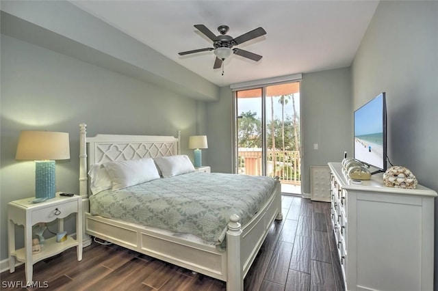 bedroom featuring access to outside, ceiling fan, and dark wood-type flooring