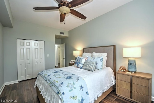 bedroom with ceiling fan, dark hardwood / wood-style floors, and a closet