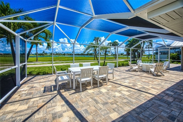 view of patio / terrace with glass enclosure