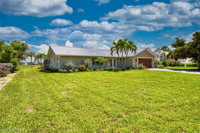 ranch-style house with a front yard and a garage