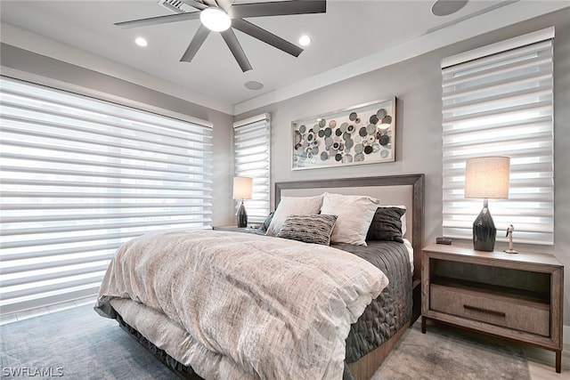 carpeted bedroom featuring ceiling fan