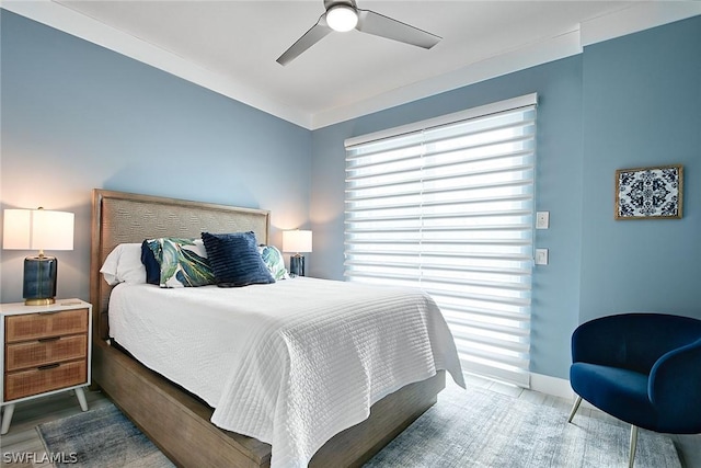 bedroom featuring ceiling fan and wood-type flooring