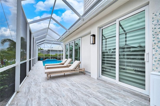 unfurnished sunroom with vaulted ceiling