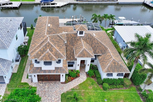 drone / aerial view featuring a water view