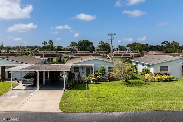 view of front of home featuring a carport and a front lawn