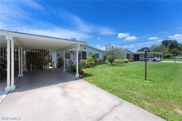 view of yard with a carport