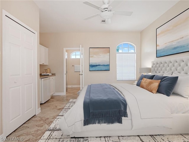 bedroom featuring ceiling fan and multiple windows