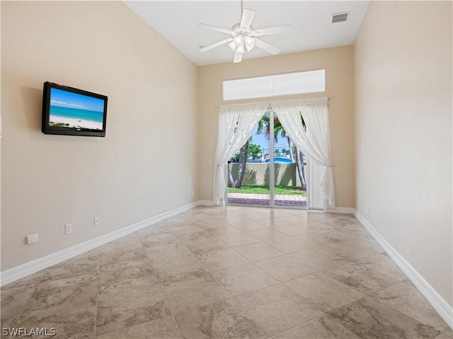 unfurnished room with ceiling fan