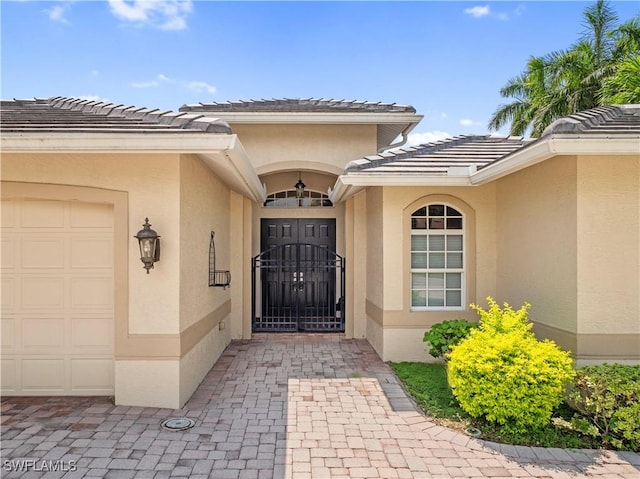 property entrance featuring a garage