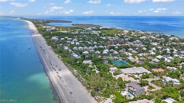 aerial view featuring a water view and a beach view