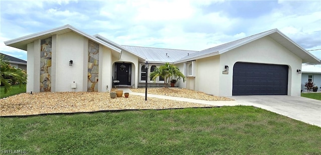 single story home featuring a garage and a front yard