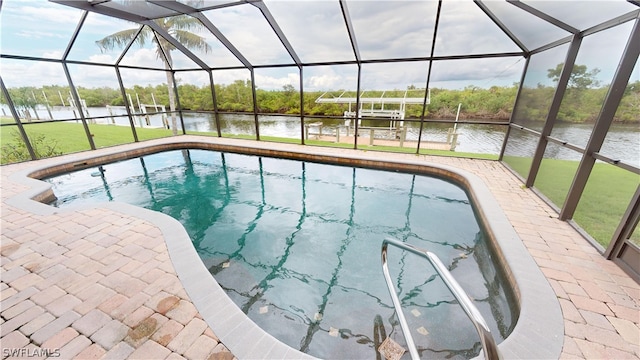 view of swimming pool featuring a patio area, a water view, and glass enclosure