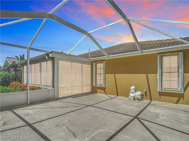 exterior space with vaulted ceiling