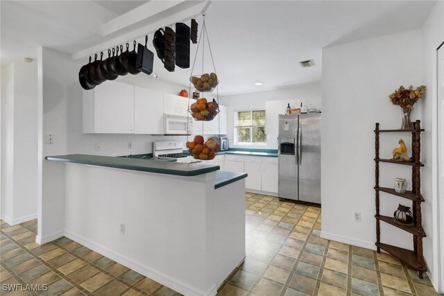 kitchen with kitchen peninsula, stainless steel refrigerator with ice dispenser, stove, and white cabinetry