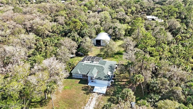 270 18th St NE, Naples, FL 34120 - aerial view of property and surrounding area with a heavily wooded area