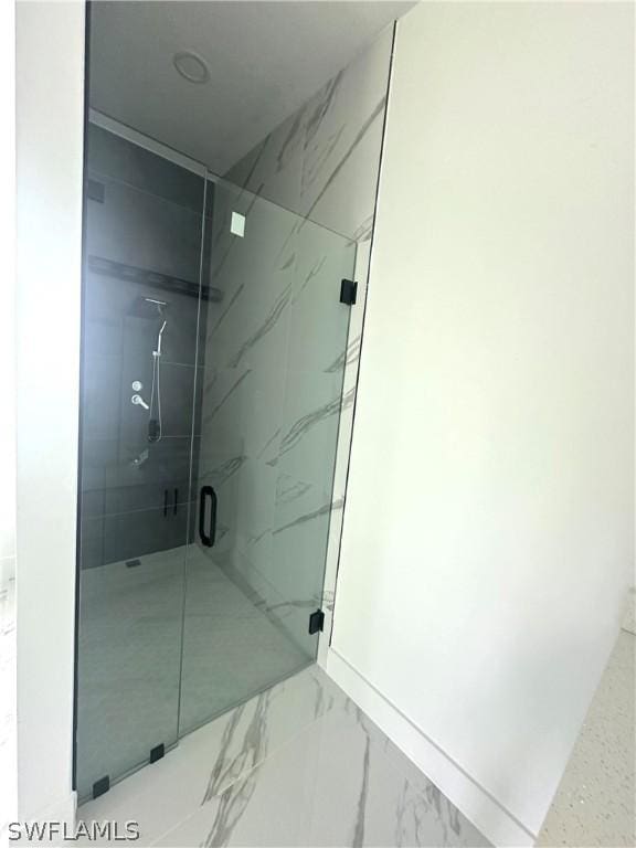 bathroom featuring walk in shower