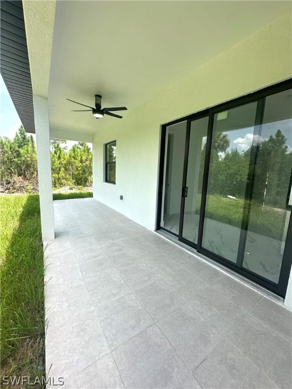 view of patio with ceiling fan