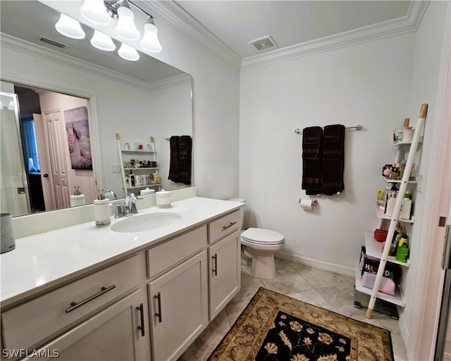 bathroom with toilet, vanity, tile patterned floors, and crown molding