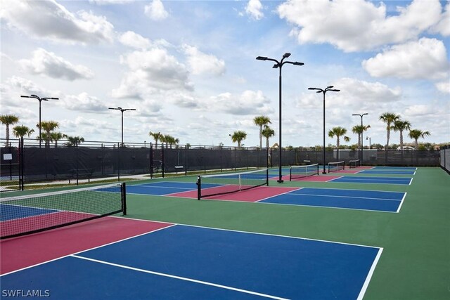 view of sport court featuring basketball hoop