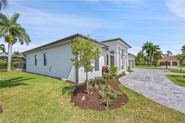 view of home's exterior featuring a lawn